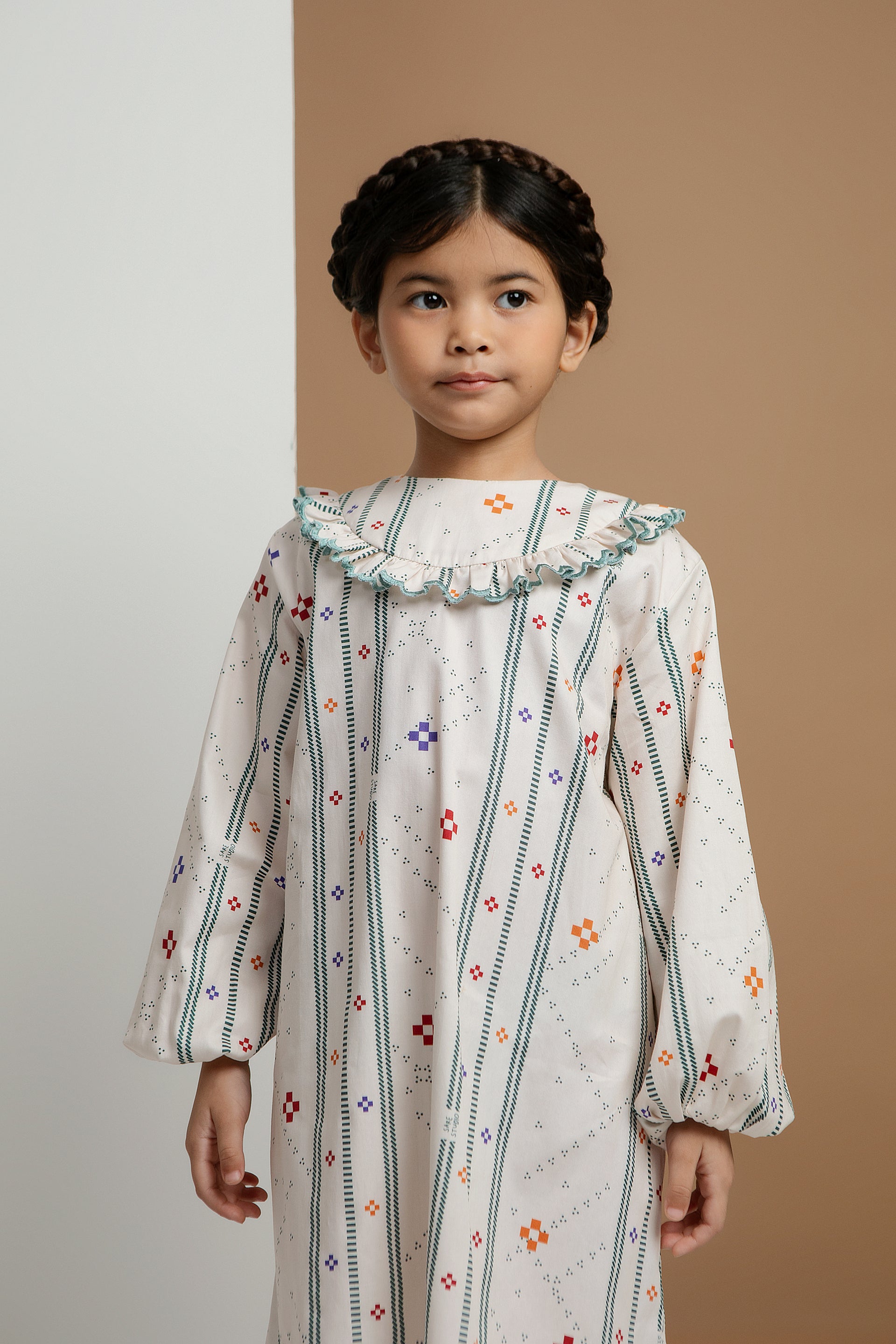 Rambai Kids Dress in Bone Bajamba